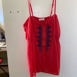 red flowy tank top
